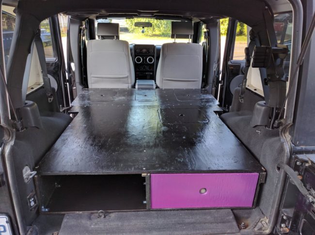 Then, a second set of smaller drawers and the largest part of the platform were installed. Unlike the front drawers, these would pull out on a sliding track.