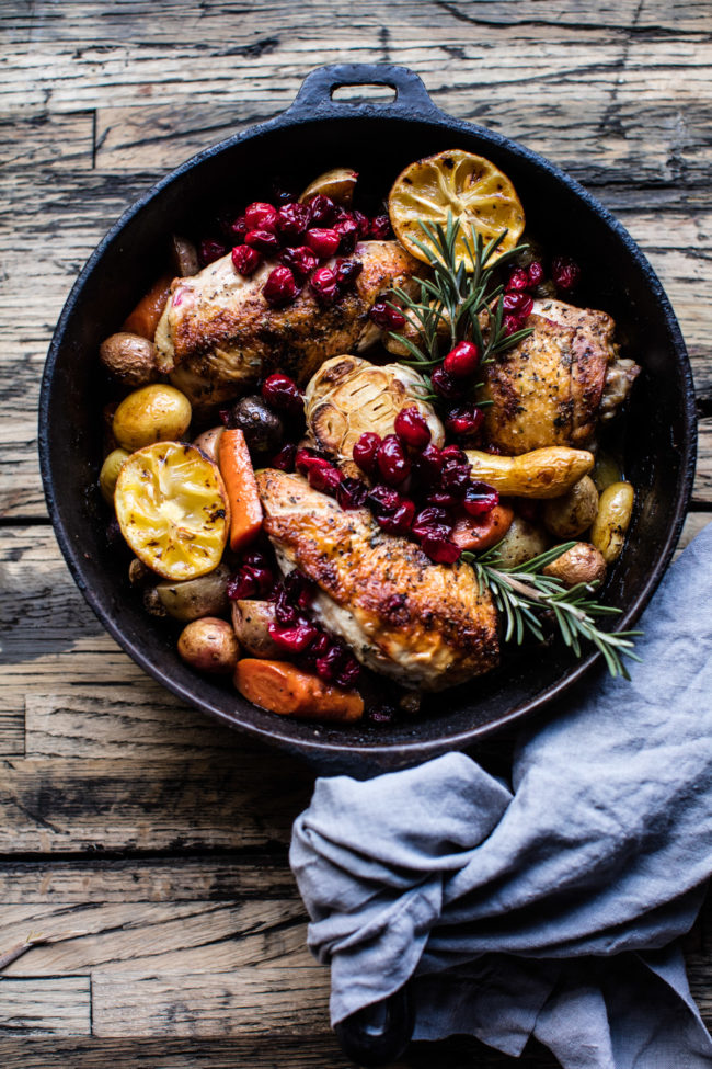 Make your chicken a little sweeter by roasting it with <a href="http://www.halfbakedharvest.com/skillet-cranberry-roasted-chicken-and-potatoes/" target="_blank">cranberries</a> and potatoes.