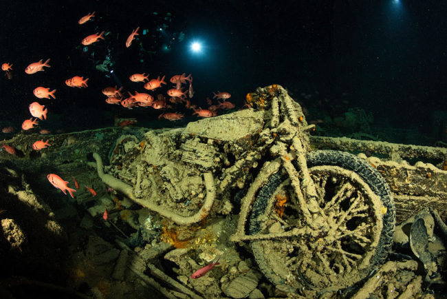 Among the wrecks are many recognizable items, such as this motorcycle. 