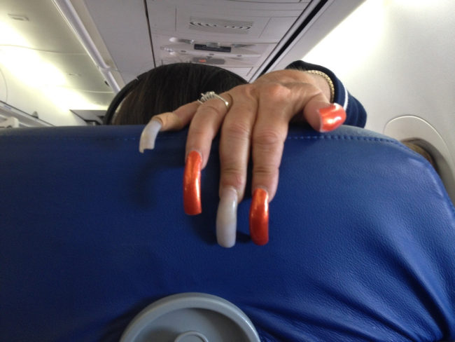 Keep your creepy, long fingernails to yourself, lady.