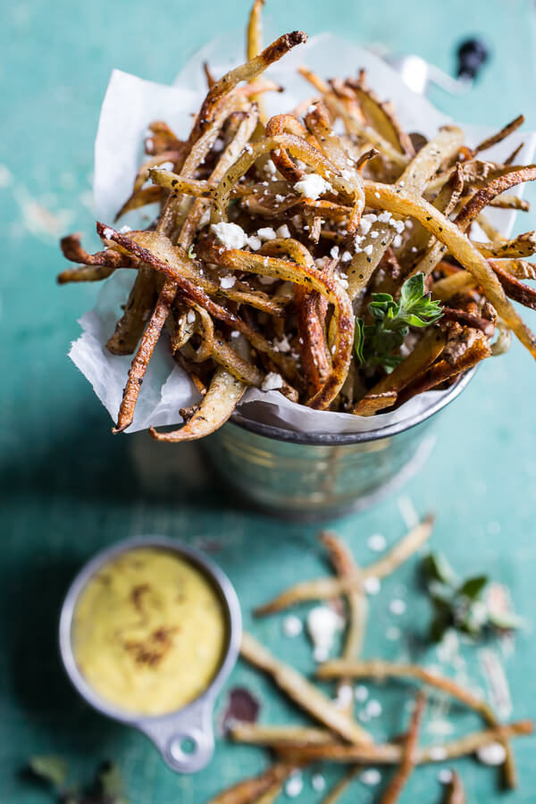 For the fancier fry lover, these <a href="http://www.halfbakedharvest.com/skinny-greek-feta-fries-with-roasted-garlic-saffron-aioli/" target="_blank">Greek shoestring fries with a garlic saffron aioli</a> will do the trick.
