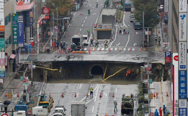 Commuters in Fukuoka, Japan, were in for quite the delay when a large sinkhole opened up in the middle of the street.