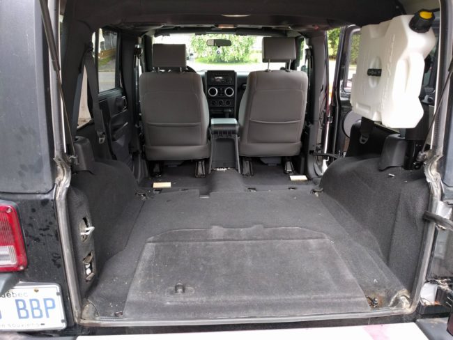 First, she removed the back seats. Once they were gone, there was a lot of empty space to work with.