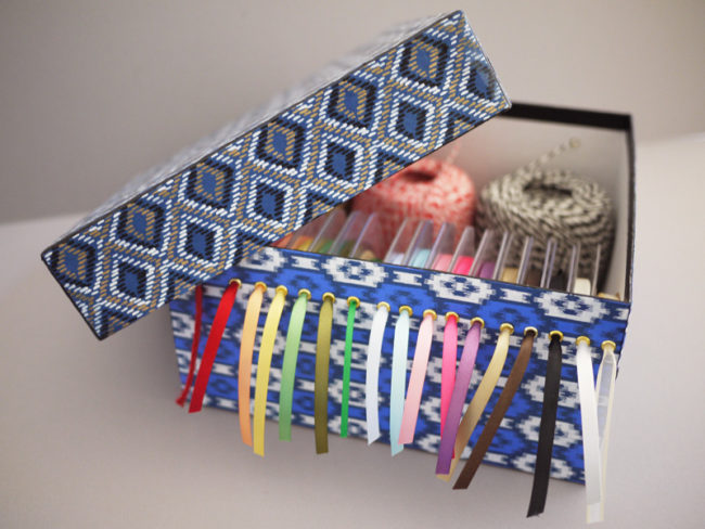 Organize your yarn and ribbon with this epic <a href="http://honestlywtf.com/diy/diy-ribbon-storage-box/" target="_blank">dispenser box</a>.