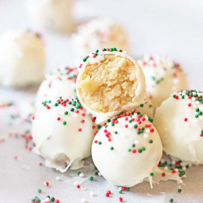The creator of these <a href="http://www.ifyougiveablondeakitchen.com/2016/10/31/christmas-sugar-cookie-truffles/" target="_blank">sugar cookie truffles</a> says each one is a "rolled-up ball of Christmas goodness."