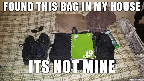 After taking the tree out, he saw a small, black bag that definitely didn't belong to him.  Inside were clothes, shoes, toiletries, sunglasses, and a notebook.