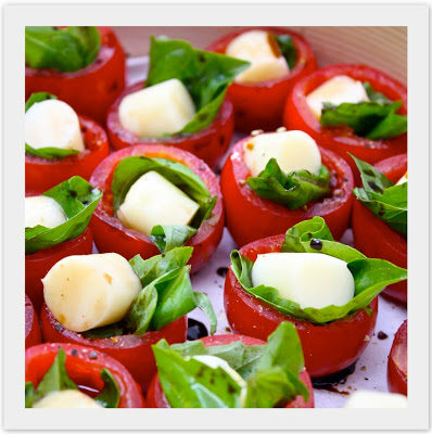 Start off your holidays and your meal right with these festively delicious, <a href="http://www.livingeventfully.com/2012/02/mini-caprese-salad-bites.html" target="_blank">bite-sized Caprese salads</a>.