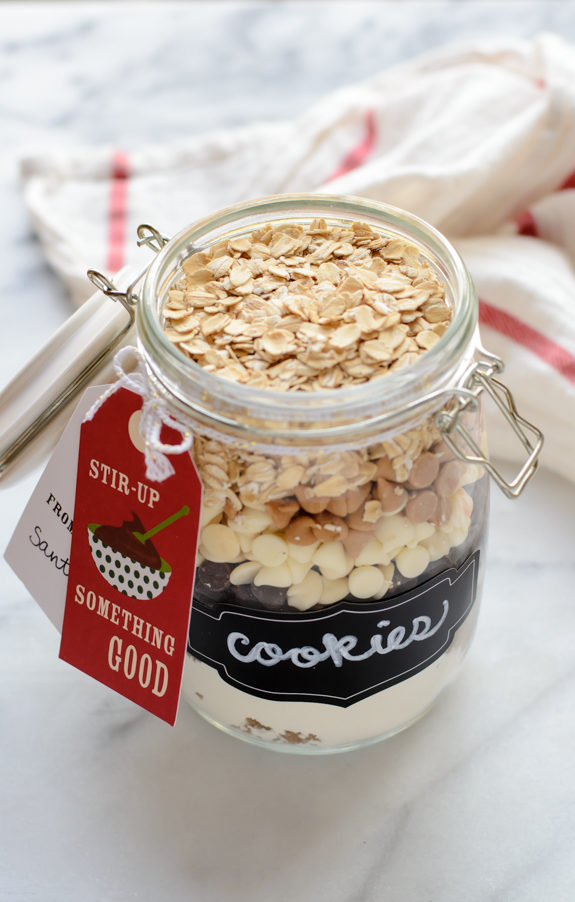 Give them their favorite <a href="http://www.wellplated.com/cookie-mix-in-a-jar/" target="_blank">cookie recipe in a jar</a>.