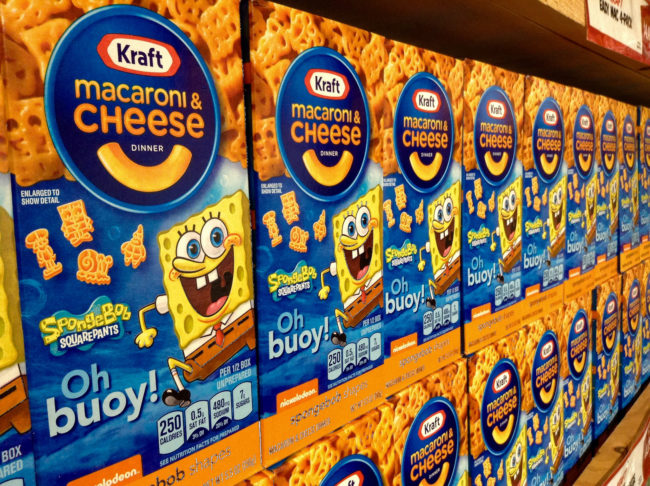 Kraft Macaroni &amp; Cheese uses artificial dyes made with petroleum, like Yellow 5 and Yellow 6.