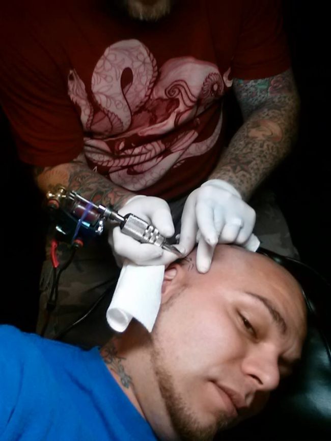 Josh found a tattoo artist and asked him to tattoo the shape of the scar on his head, too.